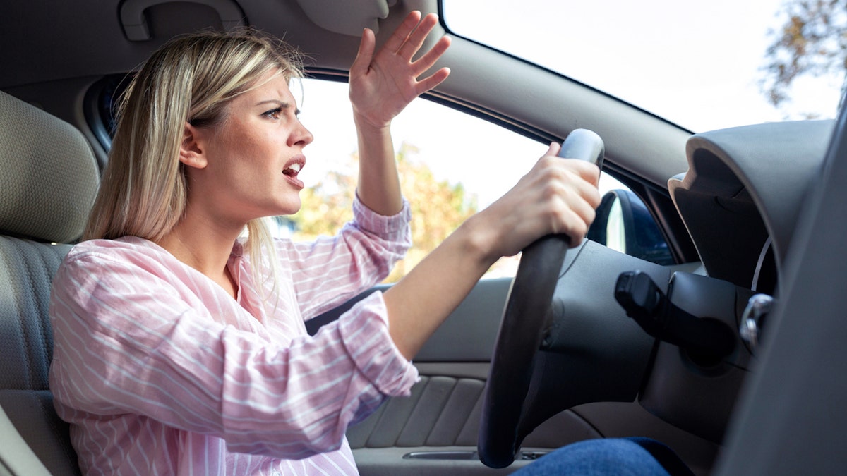 Angry woman driving