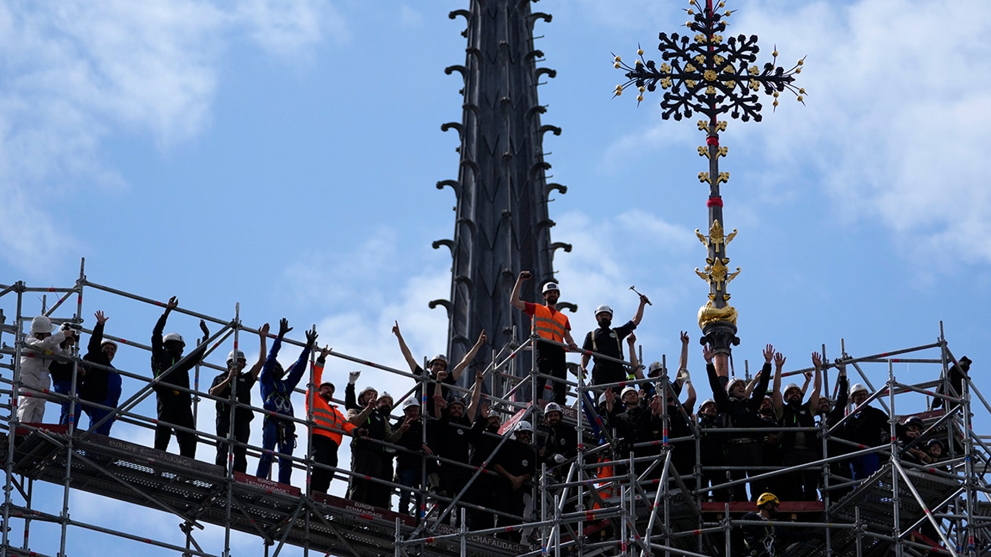 Notre Dame's Iconic Cross Reinstalled After Devastating Fire