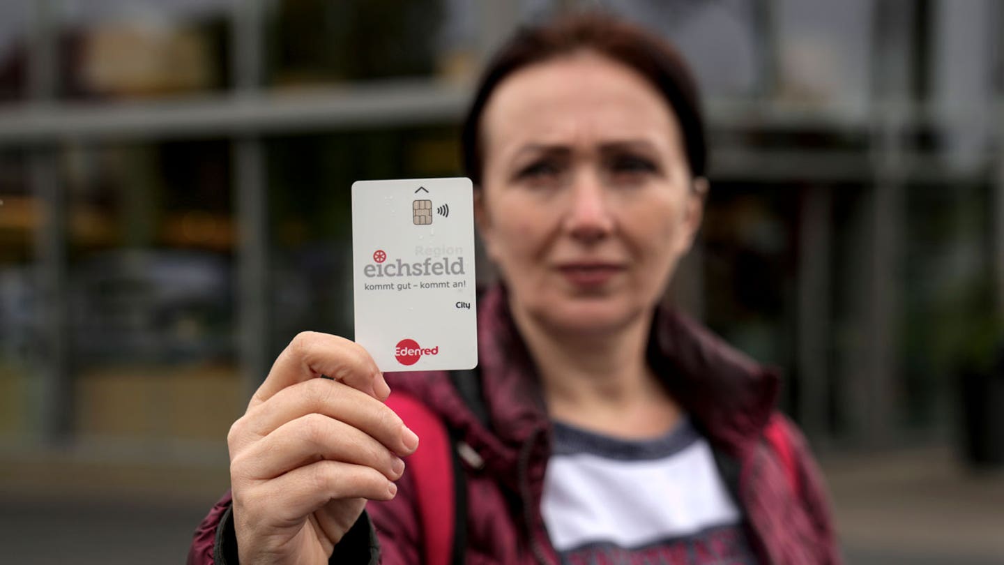 Germany introduces payment cards for asylum seekers to prevent transferring money outside country