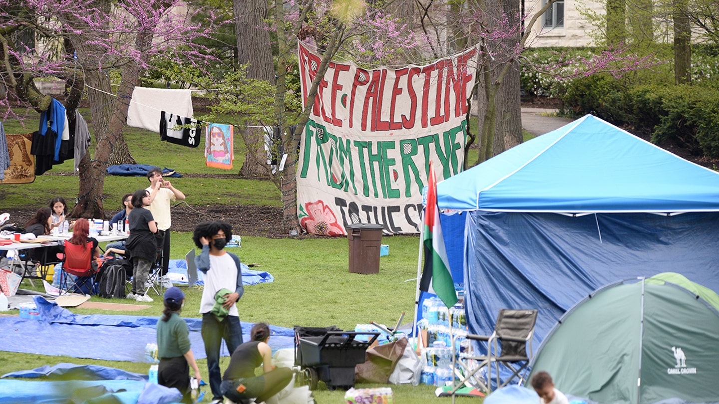 Students and residents camp outside Northwestern University during a pro-Palestinian protest, expressing solidarity with Palestinians with banners in Evanston, Illinois, United States on April 27, 2024. (Jacek Boczarski/Anadolu via Getty Images)