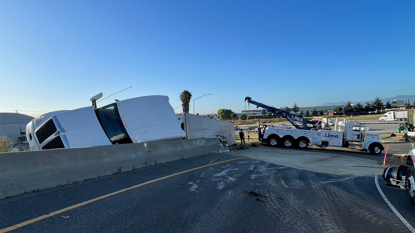 Strawberry-Slicked Highway Creates Traffic Jam After Truck Overturns