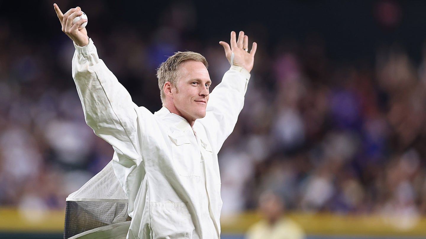 Beekeeper Matt Hilton Saves the Day at Chase Field