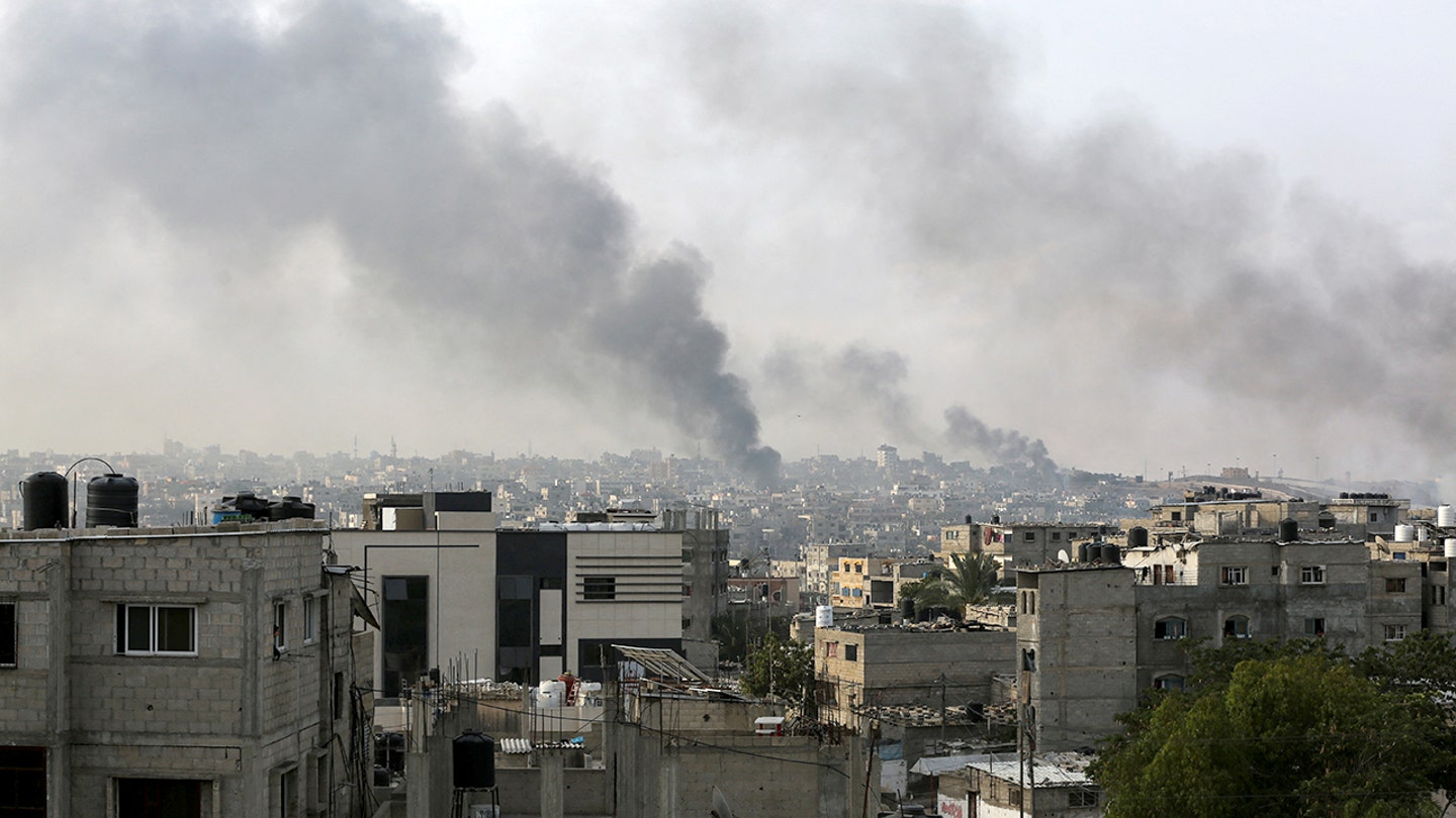 smoke rises rafah