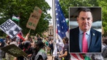 Hudson, protesters