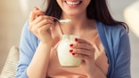 Girl eating yogurt