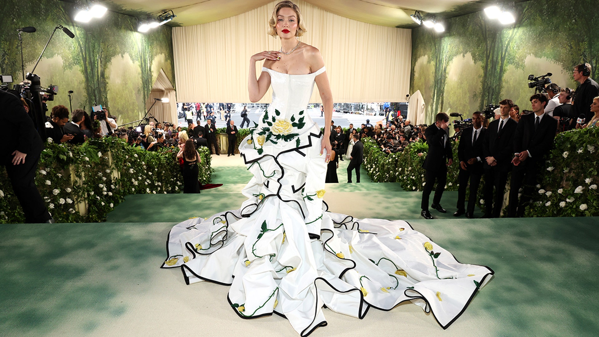 Supermodel Gigi Hadid wears white dress to Met Gala 2024.
