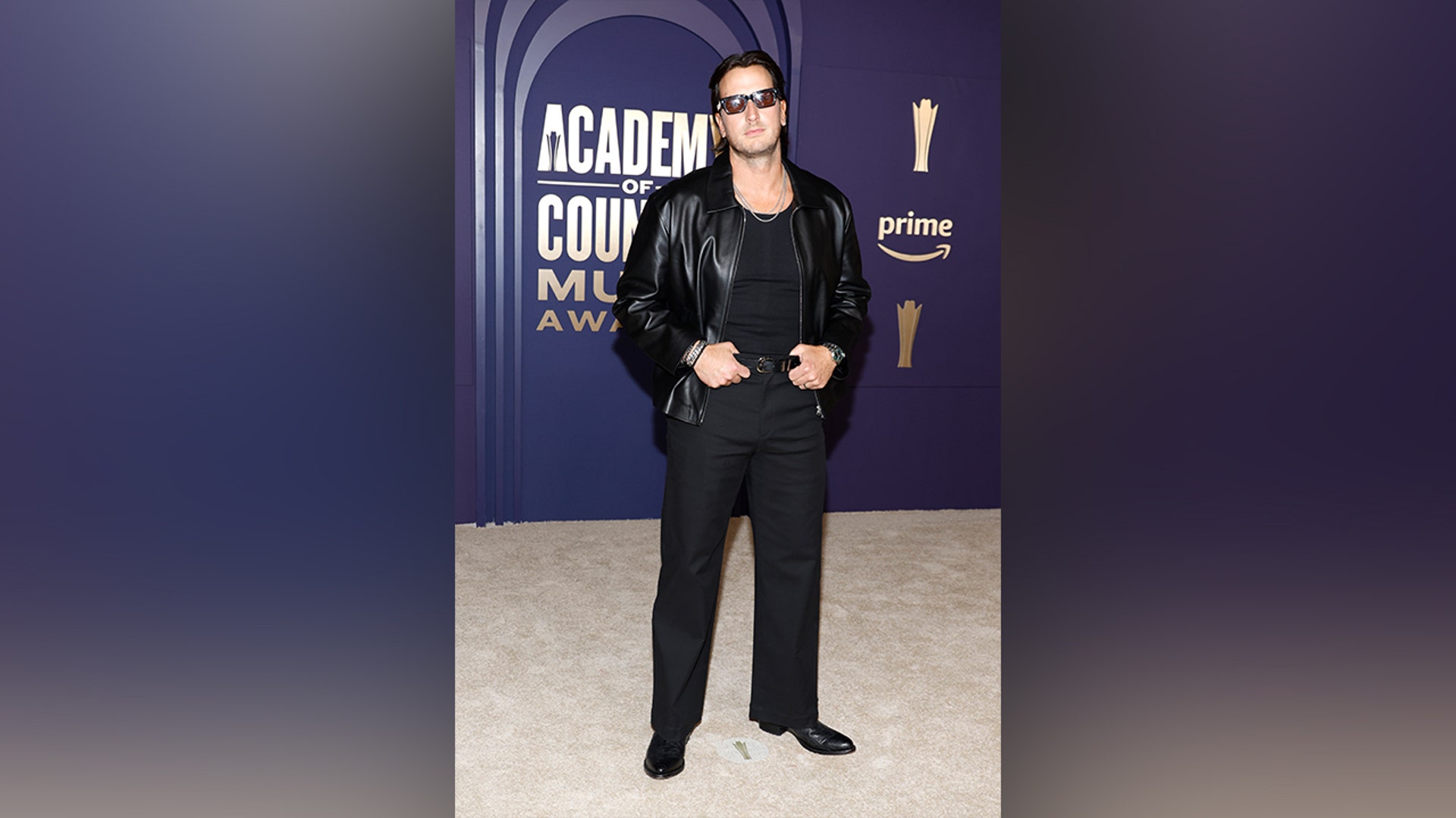 Russell Dickerson in all black at the ACMs