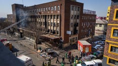Building fire that killed 76 in South Africa was caused by building negligence, report says