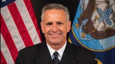 Retired Navy admiral charged with bribery for allegedly offering government contract in exchange for job