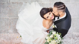 Couples asking wedding guests for cash spark fierce debate over manners and tradition