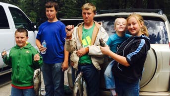 Teen miraculously survives bear attack after brother rescues him