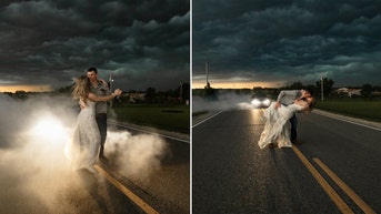 Photographer turns dramatic thunderstorm into stunning backdrop for bride and groom