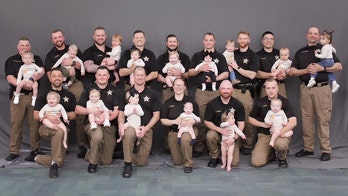 Sheriff's office celebrates major 'baby boom' as law enforcement poses for sweet photo with their 15 kids