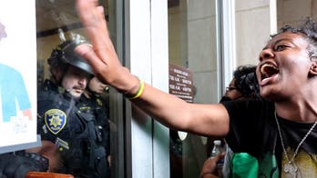UCLA anti-Israel protesters clash with police after blocking access to campus buildings