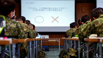 Japan's military struggles to recruit women following series of sexual harassment cases