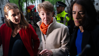 Ex-head of UK’s Post Office breaks down while testifying about scandal that saw hundreds wrongly convicted