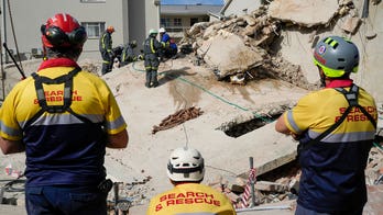 Rescue efforts for workers trapped in South Africa building collapse continues, 1 more survivor found