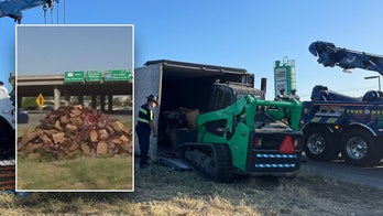 Truck carrying 40K pounds of strawberries overturns creating sticky traffic jam
