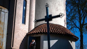 War-scarred village in Ukraine finds solace in vibrant new church
