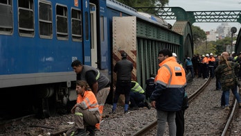 At least 90 injured after passenger train hits boxcar, derails in Argentine capital