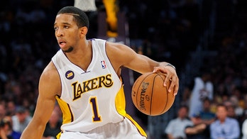 Lakers' 2011 draft pick died of coronary heart disease, medical examiner says