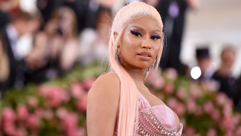Rapper Nicki Minaj films own arrest in Amsterdam