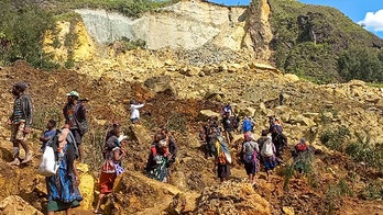 Papua New Guinea says landslide buries over 2,000 people alive