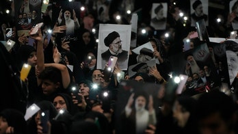 Iranian crowd chants 'death to America' at funeral for dead president
