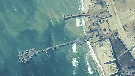 U.S. Navy Vessel Beached after Pier Retrieval Attempt