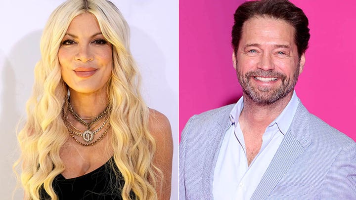 Tori Spelling walks the red carpet at the 2024 iHeartRadio Music Awards
