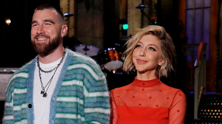 Taylor Swift and Travis Kelce embrace at Coachella 