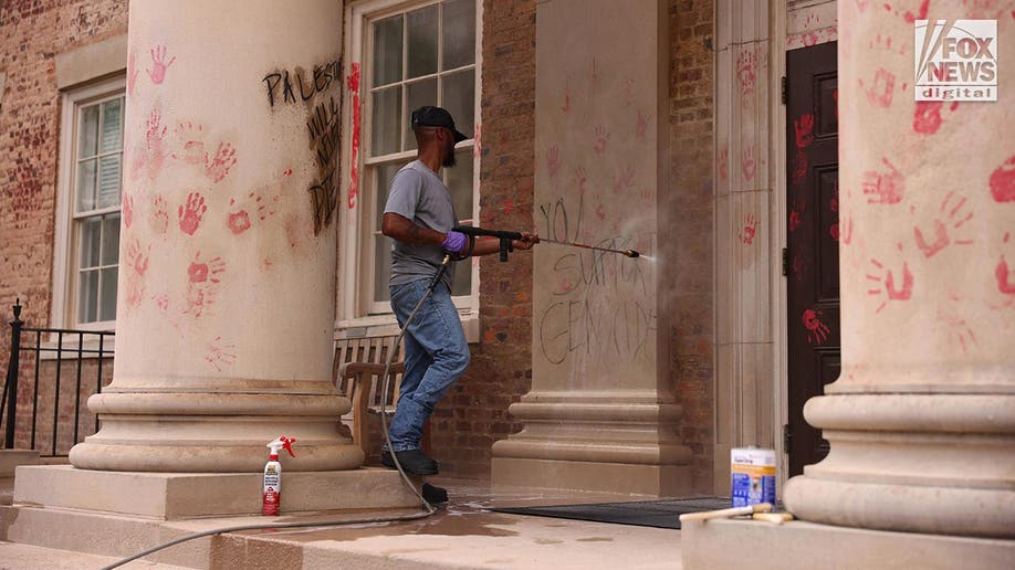 Vandalized Chancellor's building being cleaned