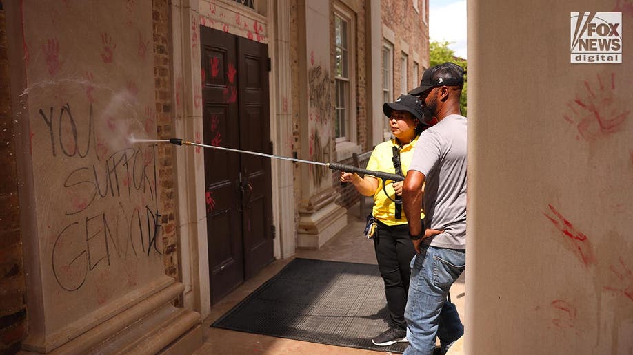 Vandalized Chancellor's building being cleaned