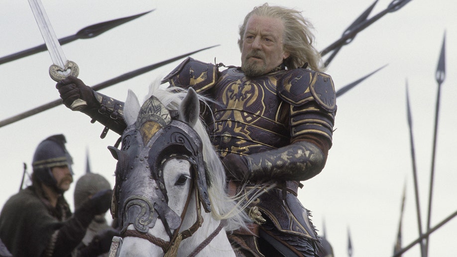 Bernard Hill as Théoden, King of Rohan in 'The Lord of the Rings' riding on a horse