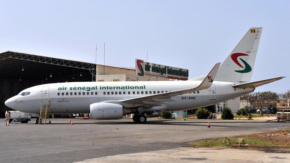 Boeing 737 catches fire, skids off runway at Senegal's main airport