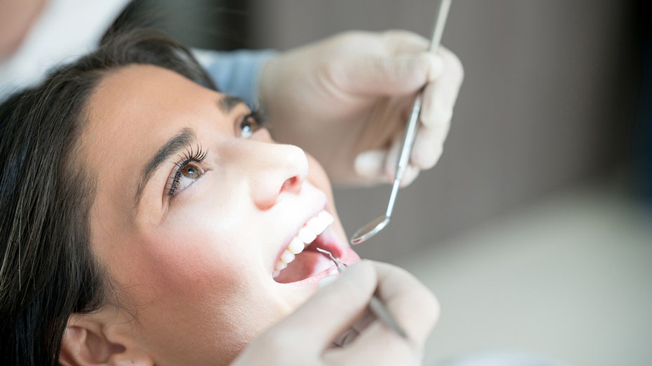 Women experience more dental health issues than men, experts say. Here’s what to do about it