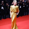 Cate Blanchett channeled one of her Oscars when she walked the red carpet at the Cannes Film Festival in a gold Louis Vuitton dress.