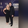 Patty Hanson Puskar and Charles Esten matching in black at ACM Awards