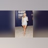 Mackenzie Porter at the 2024 ACM Awards red carpet in a short dress