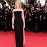 Cate Blanchett walked the carpet at the Cannes Film Festival in a black and pink Jean Paul Gaultier gown with a pearl band across her back.