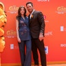 Katherine Schwarzenegger and Chris Pratt at "The Garfield Movie" premiere in custom Paul Smith outfits.