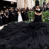 Cardi B at the Met Gala 2024 red carpet wearing a voluminous black tulle ball gown.