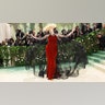 Gwendoline Christie wears red velvet dress at the met gala