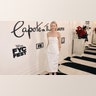 Naomi Watts walked the carpet at the Feud: Capote Vs. The Swans FYC event in a strapless figure-hugging white gown.