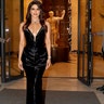 Priyanka Chopra stepped out of her hotel in Rome, Italy in a sequined black dress with a plunging neckline.