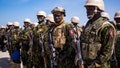 Police from Kenya stand on the tarmac of the Toussaint Louverture International Airport after landing in Port-au-Prince, Haiti, Tuesday, June 25, 2024. The first U.N.-backed contingent of foreign police arrived nearly two years after the Caribbean country requested help to quell a surge in gang violence.