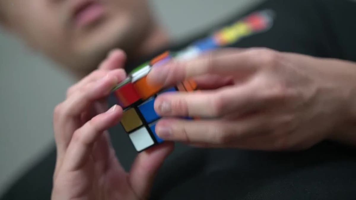 The man with the Rubik's cube