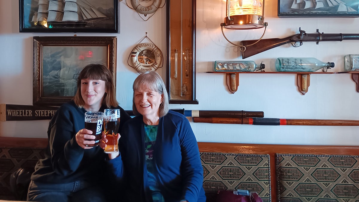 woman and younger woman at pub
