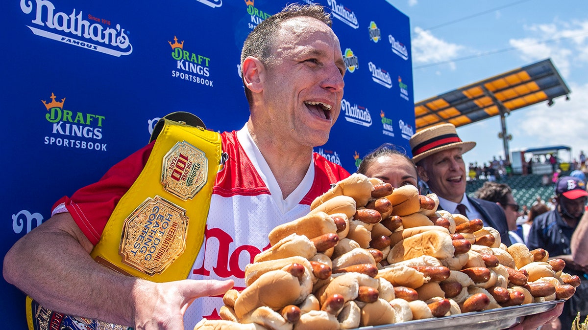 Joey Chestnut with hot dogs