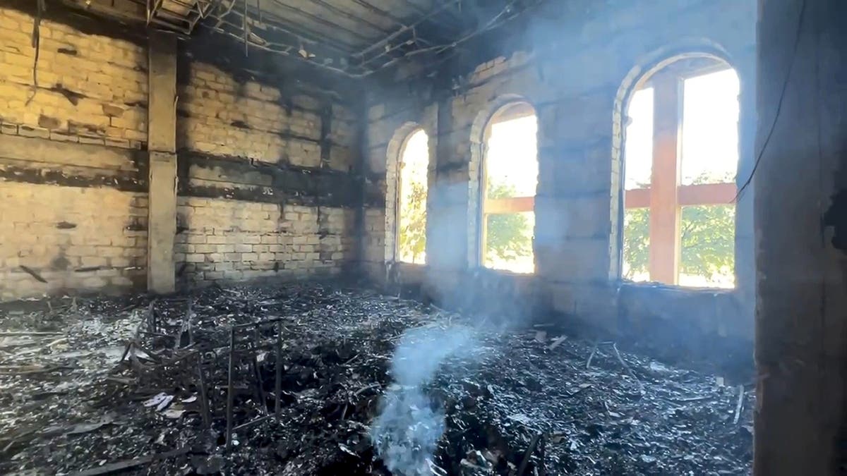 charred scene after Russian attack